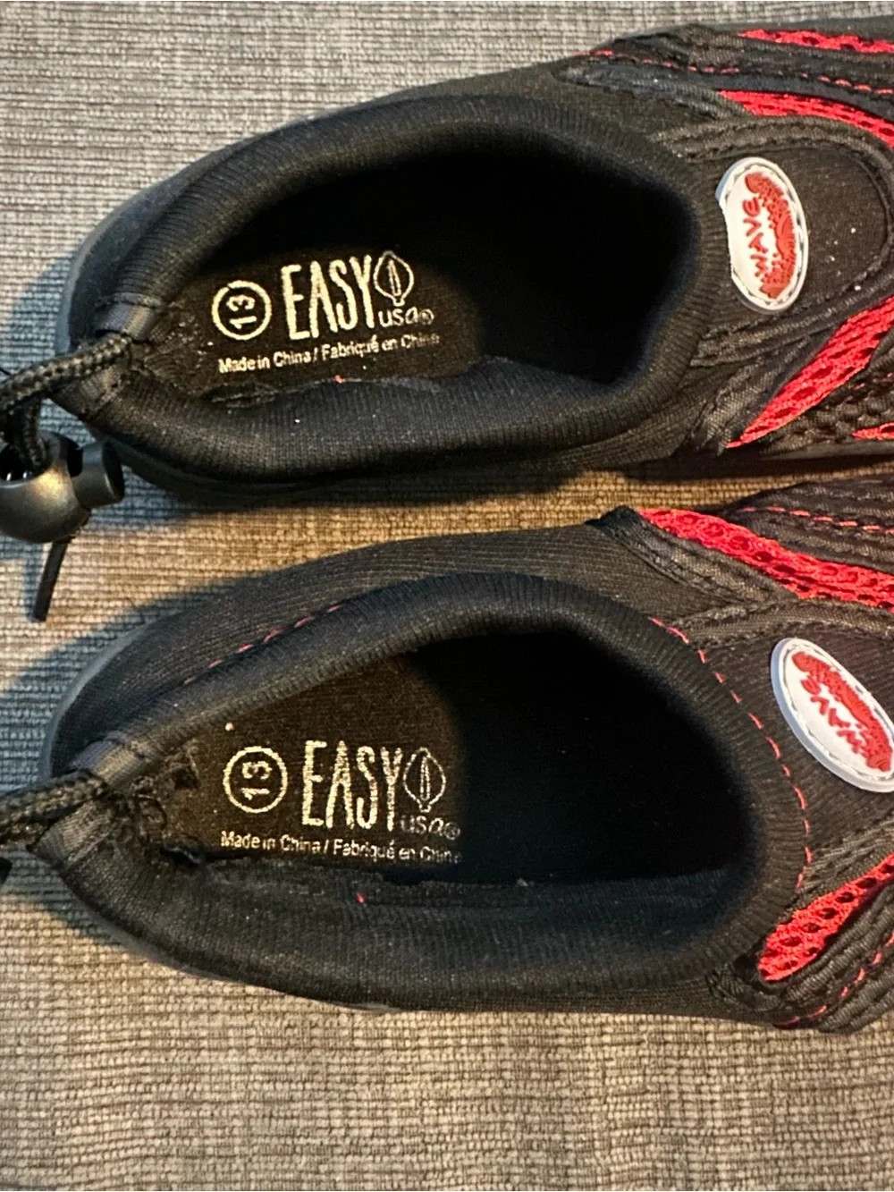 Easy USA hard sole water shoes. Kids size 13. Black and red.
